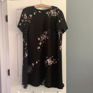 Black dress with flowers.